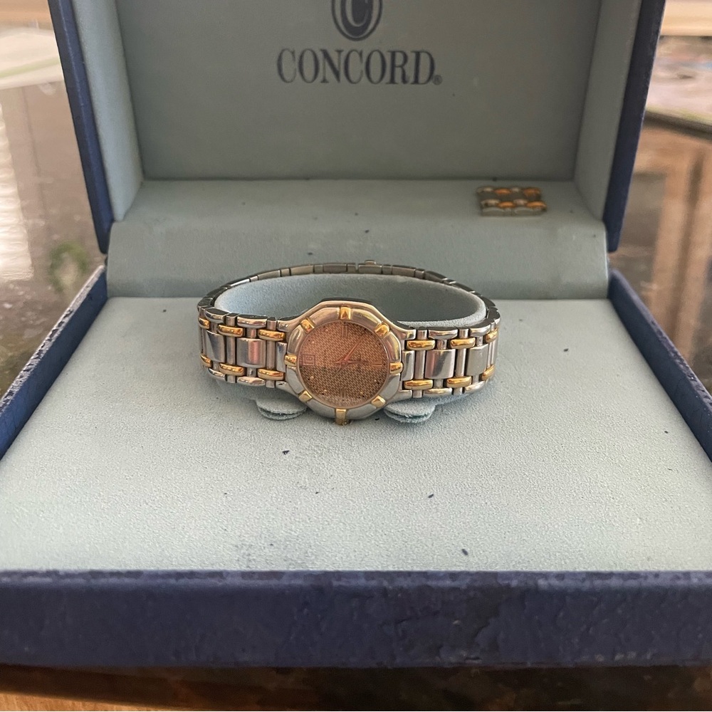 Concord Saratoga, stainless and 18k,
Gold face watch
